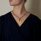 Pendentif DINH VAN - PI - Pendentif en or jaune et cordon de soie noir 58 Facettes DV26635-5