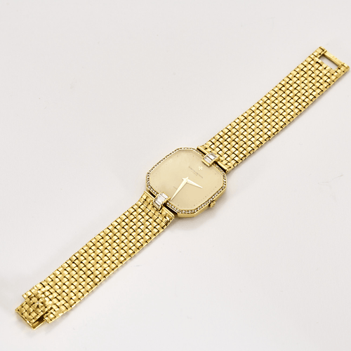 Montre Vacheron Constantin - Montre en or jaune à boitier carré à pans coupés à mouvement quartz 58 Facettes DV26220-7