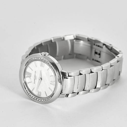 Montre Baume et Mercier - Montre de dame en acier et diamants 58 Facettes DV25965-1
