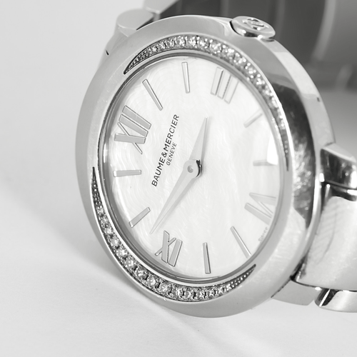 Montre Baume et Mercier - Montre de dame en acier et diamants 58 Facettes DV25965-1