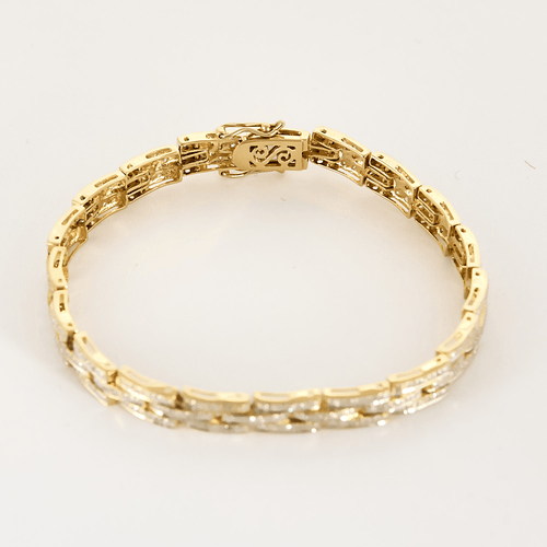 Bracelet Bracelet en or jaune articulé et diamants 58 Facettes DV0640-14
