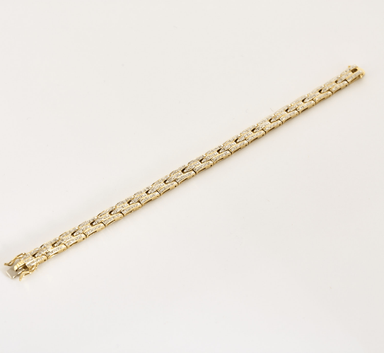 Bracelet Bracelet en or jaune articulé et diamants 58 Facettes DV0640-14