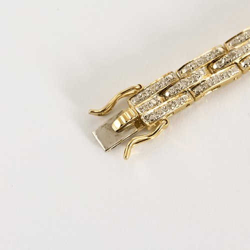 Bracelet Bracelet en or jaune articulé et diamants 58 Facettes DV0640-14