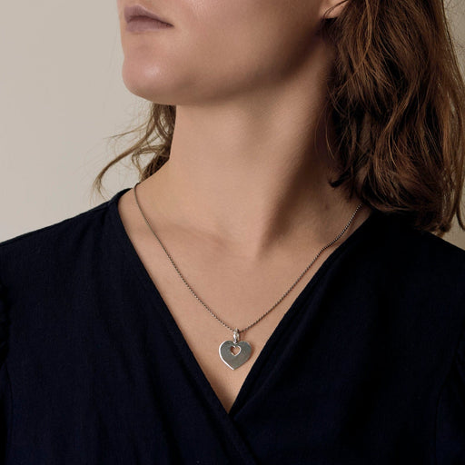 Pendentif Poiray - "Coeur secret" - Pendentif en or gris et diamants 58 Facettes DV26545-1