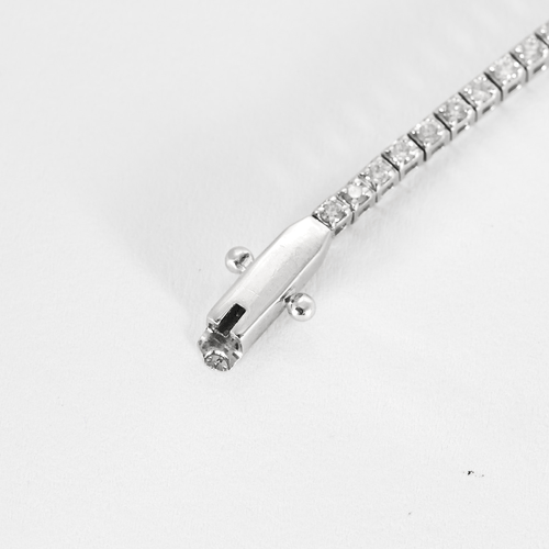 Bracelet Bracelet ligne en or gris et diamants 58 Facettes DV0315-17