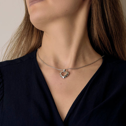 Pendentif Pendentif « coeur » ajourée et bombée en or blanc et diamants 58 Facettes DV27468-57
