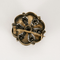 Broche en or rose et or gris à motif de fleur ponctuée d'étoile et diamants de taille rose 58 Facettes DV0013-35