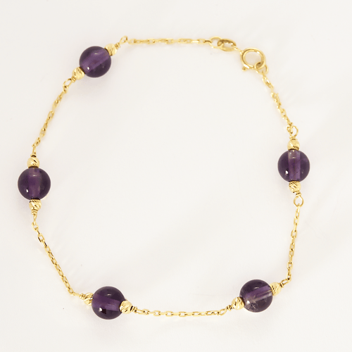 Bracelet Bracelet en or jaune et perles d'améthyste 58 Facettes DV24577-4