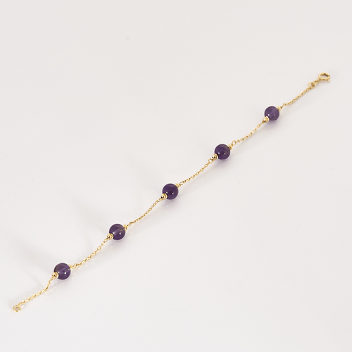 Bracelet Bracelet en or jaune et perles d'améthyste 58 Facettes DV24577-4