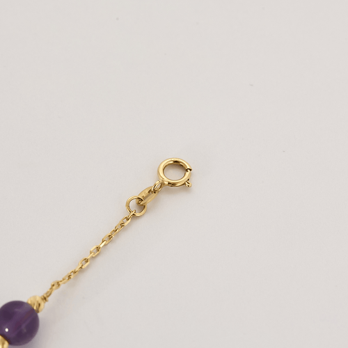 Bracelet Bracelet en or jaune et perles d'améthyste 58 Facettes DV24577-4