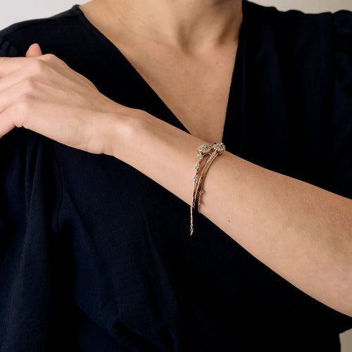 Bracelet Bracelet jonc ouvrant en or rose, or blanc et diamants 58 Facettes DV27468-22