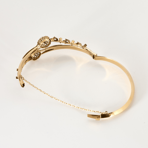 Bracelet Bracelet jonc ouvrant en or rose, or blanc et diamants 58 Facettes DV27468-22