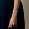 Montre VAN CLEEF & ARPELS - Montre en acier et acier plaqué or à boitier rond et mouvement quartz 58 Facettes DV11451-21