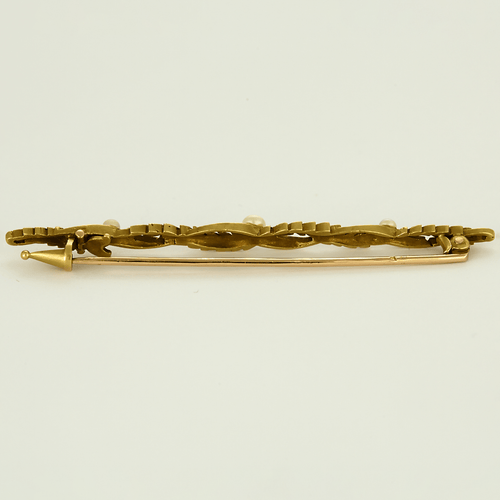Broche barrette en or jaune et perles  blanche