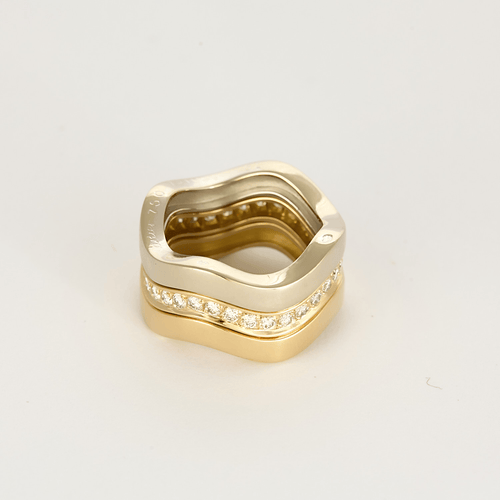 Bague 52 CARTIER - Neptune - Vintage - Bague trois anneaux or jaune, or gris et diamants 58 Facettes DV28241-2