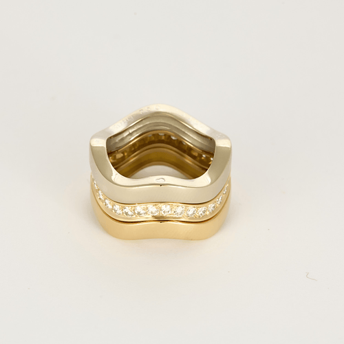Bague 52 CARTIER - Neptune - Vintage - Bague trois anneaux or jaune, or gris et diamants 58 Facettes DV28241-2