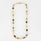 Long collier en or jaune et pierres fines de couleurs