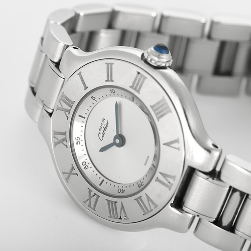 Montre Cartier - Must - Montre en acier à mouvement quartz et boitier rond 58 Facettes DV27342-10