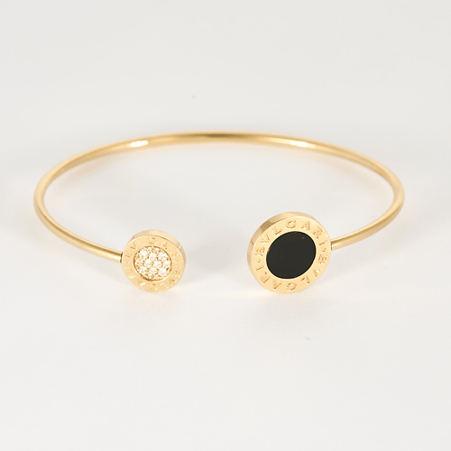 Bracelet BVLGARI - Bvlgari Bvlgari - Bracelet jonc ouvert en or jaune, onyx et diamants 58 Facettes DV27778-1