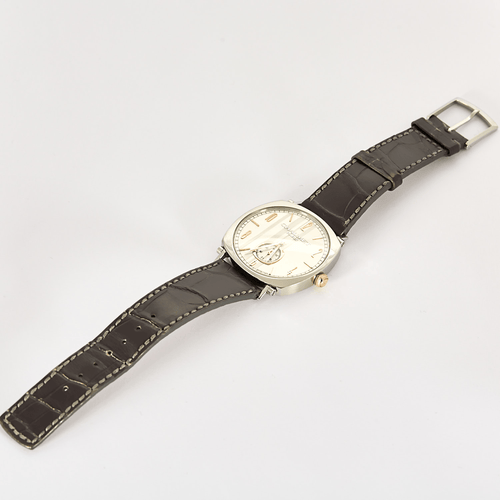 Montre CHAUMET - DANDY - Montre en acier, acier doré à boitier tonneau et à mouvement mécanique 58 Facettes DV27973-1