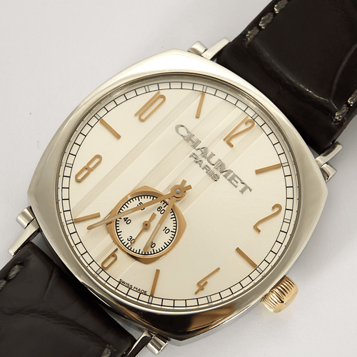 Montre CHAUMET - DANDY - Montre en acier, acier doré à boitier tonneau et à mouvement mécanique 58 Facettes DV27973-1