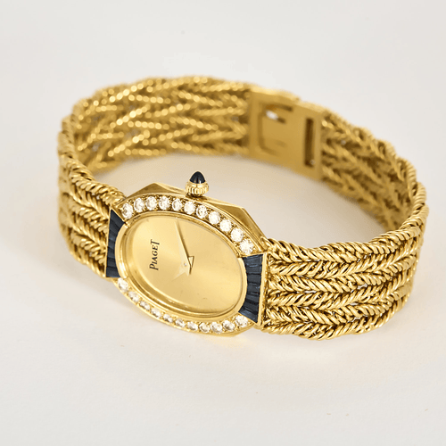 Montre PIAGET - Montre de dame en or jaune, saphir et diamants 58 Facettes DV22202-1