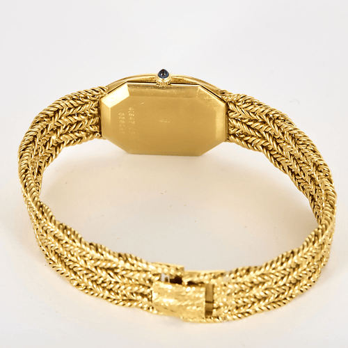 Montre PIAGET - Montre de dame en or jaune, saphir et diamants 58 Facettes DV22202-1
