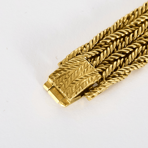 Montre PIAGET - Montre de dame en or jaune, saphir et diamants 58 Facettes DV22202-1
