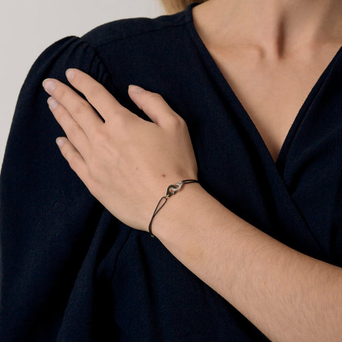 Bracelet DINH VAN - Menottes R8 - Bracelet cordon et or gris, diamants 58 Facettes DV31314-1