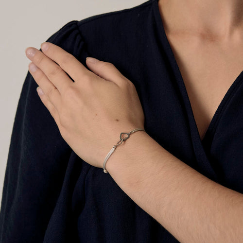 Bracelet Dinh Van - Double coeurs - Bracelet en or blanc 18K (750 millièmes) 58 Facettes DV31202-1