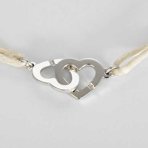 Bracelet Dinh Van - Double coeurs - Bracelet en or blanc 18K (750 millièmes) 58 Facettes DV31202-1