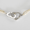 Bracelet Dinh Van - Double coeurs - Bracelet en or blanc 18K (750 millièmes) 58 Facettes DV31202-1