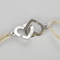 Bracelet Dinh Van - Double coeurs - Bracelet en or blanc 18K (750 millièmes) 58 Facettes DV31202-1