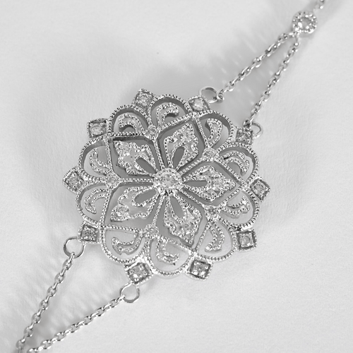 Bracelet Poiray - Rosace - Bracelet en or blanc et diamants 58 Facettes DV31817-2
