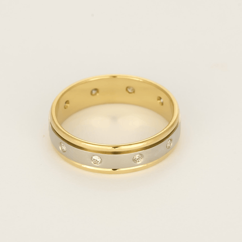 Élégante bague jonc en or jaune et or blanc, diamants : 0,45 carat