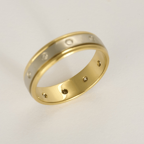 Bague 61 Élégante bague jonc en or jaune et or blanc, diamants : 0,45 carat 58 Facettes DV32130-1
