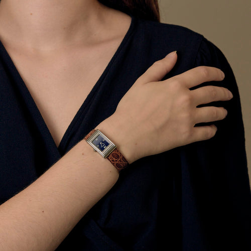 Boucheron - Montre Reflet en acier et cadran bleu 58 Facettes DV8953-11