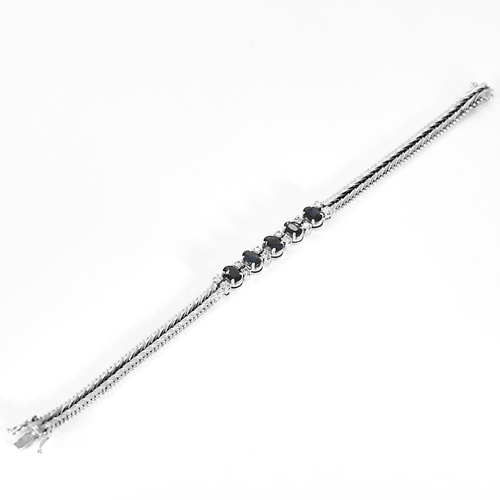 Bracelet en or blanc, saphirs : 1,5 carat et diamants : 0,60 carat 58 Facettes DV32533-4