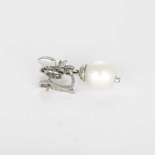 Boucles d'oreilles en or blanc, perles de cultures et diamants : 0,80 carat 58 Facettes DV31450-48