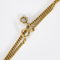 Collier en or jaune à maille gourmette et pendentif filigrané à motif de fleur 58 Facettes DV32806-5