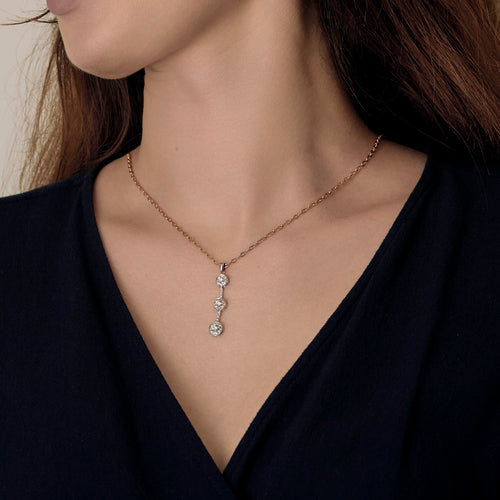 Pendentif trilogie en or gris et diamants 58 Facettes DV32729-12