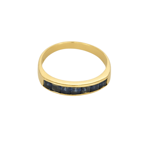 Élégante bague jonc en or jaune et saphirs calibrés