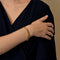 Bracelet en or jaune articulé à maille rectangulaire 58 Facettes DV32690-1