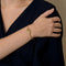 DINH VAN - Menottes R12 - Élégant bracelet en or jaune et diamants 58 Facettes DV33748-1