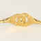 DINH VAN - Menottes R12 - Élégant bracelet en or jaune et diamants 58 Facettes DV33748-1