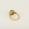 Bague marguerite en or jaune, diamants et émeraude