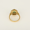 Bague marguerite en or jaune, diamants et émeraude