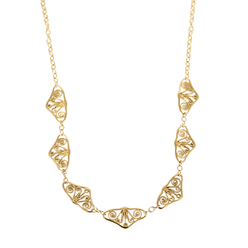 Élégant collier draperie en or jaune
