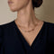 Élégant collier draperie en or jaune