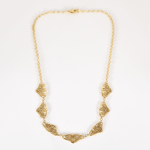Élégant collier draperie en or jaune